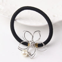 Load image into Gallery viewer, Hollow Flower Pearl Hair Tie